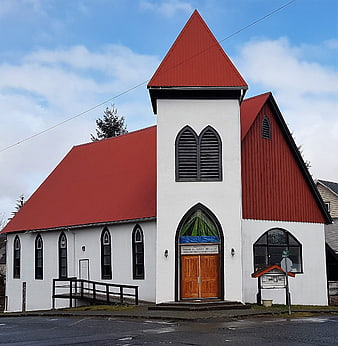 White Church with Red Roof and Stained Glass