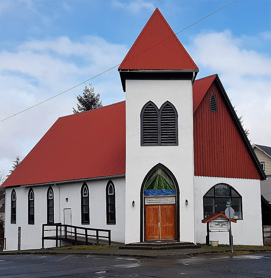 White Church with Red Roof and Stained Glass