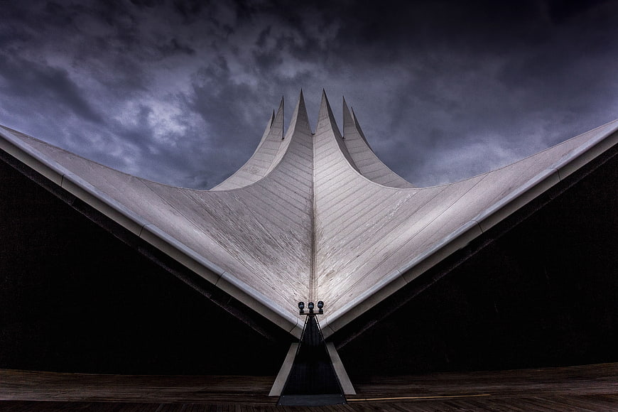 Dramatic low angle view of modern concrete church roof