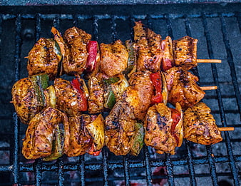 Grilled Chicken Skewers with Peppers on Barbecue Grill