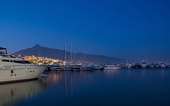 Luxury Yachts Docked in Harbor at Blue Hour