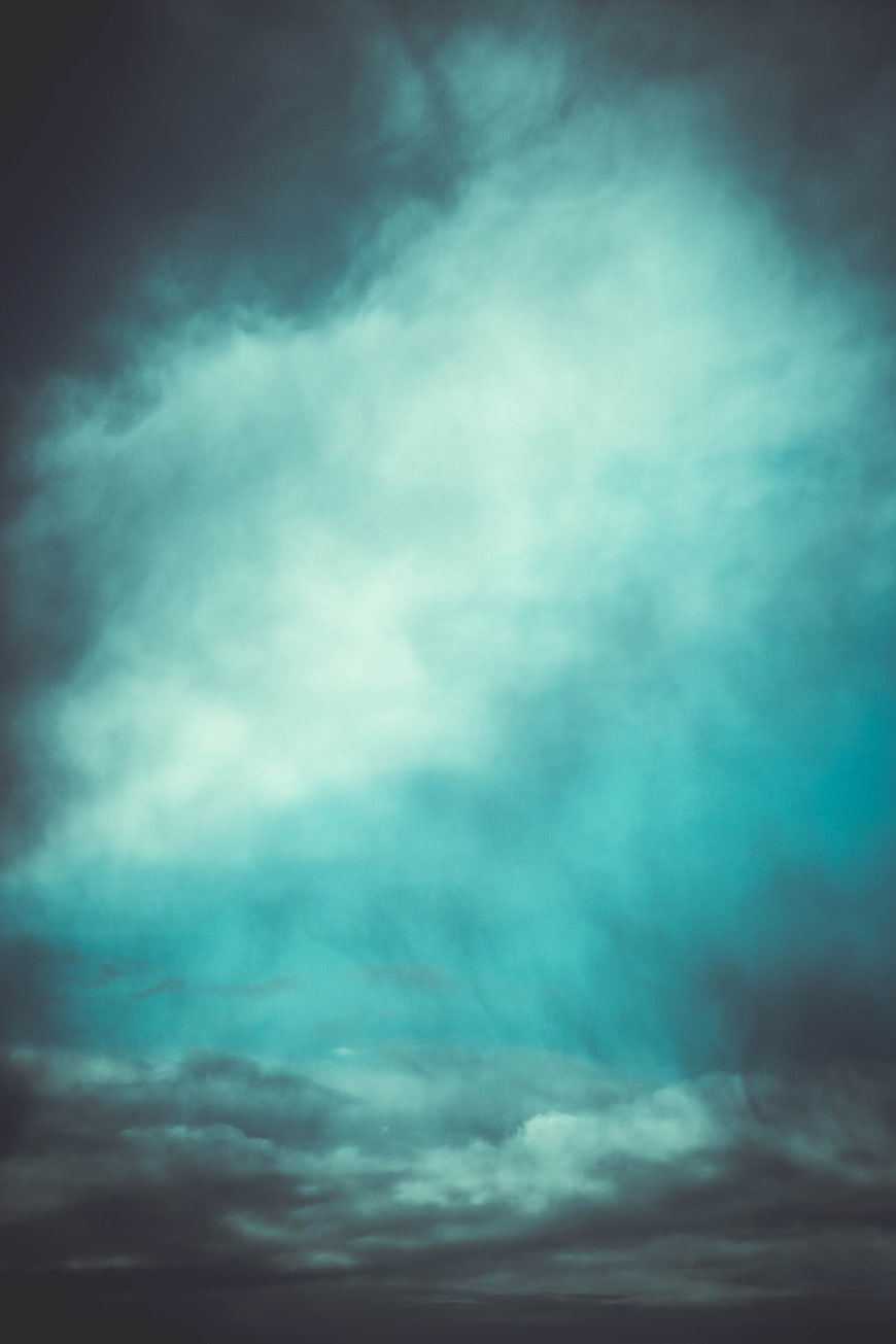 Dramatic Teal and Cyan Clouds in Stormy Sky