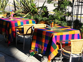 Colorful Plaid Tablecloths on Outdoor Cafe Patio