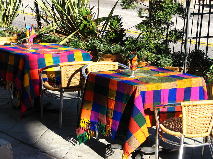 Colorful Plaid Tablecloths on Outdoor Cafe Patio