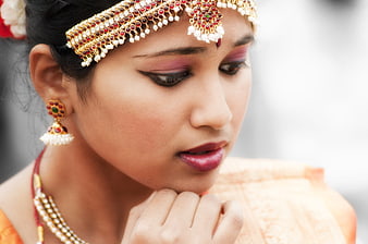 Indian Woman in Traditional Jewelry and Makeup Portrait
