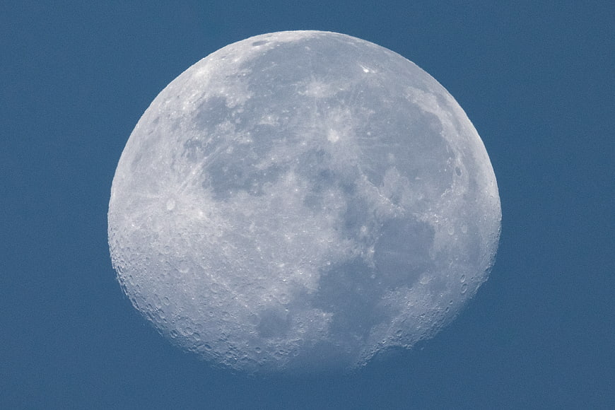 Full Moon in Blue Sky with Craters