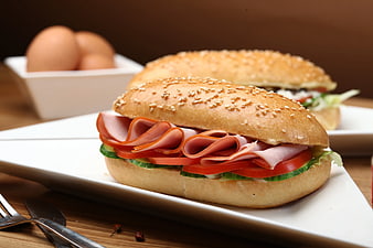 Delicious Ham and Vegetable Sandwiches on White Plate