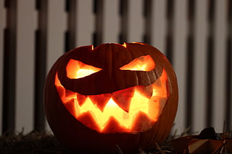 Glowing Jack O'Lantern with Scary Face on Halloween Night