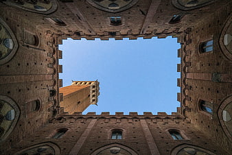 Low angle view of Sforza Castle courtyard and tower