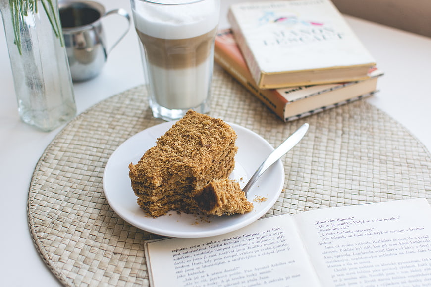 Traditional Czech Honey Cake with Caffe Latte and Books