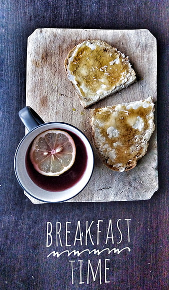 Rustic breakfast flat lay with honey bread and lemon tea