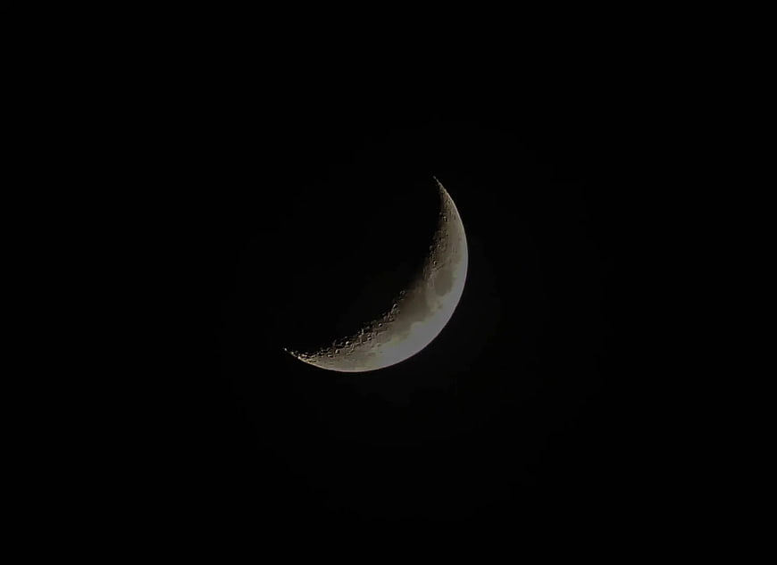 Crescent Moon in Dark Night Sky