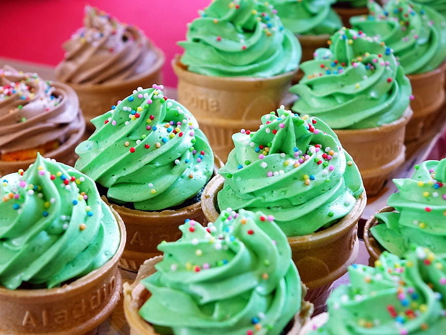 Green Mint Cupcakes with Sprinkles in Waffle Cones