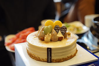 Paris Baguette Cream Cake With Heart Decorations And Almonds