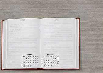Open 2019 Planner Notebook With January And February Calendars