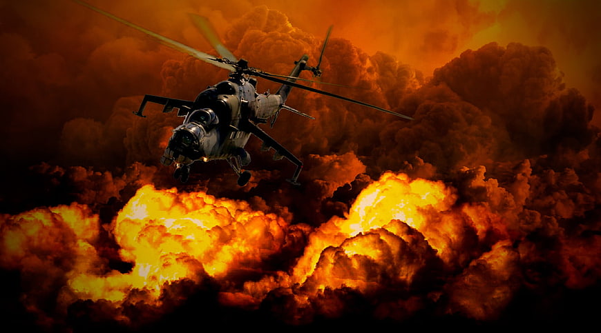 Military Helicopter Flying Over Massive Fire Explosion