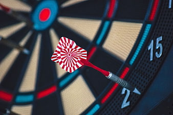 Red and White Dart Hitting Target on Board