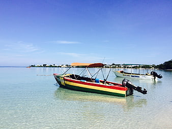 Colorful Fishing Boat Moored In Calm Tropical Waters