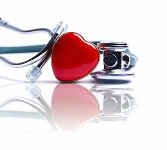 Red Heart and Stethoscope on White Background