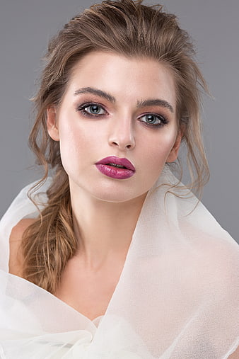 Studio Beauty Portrait Of Young Woman With Dramatic Makeup