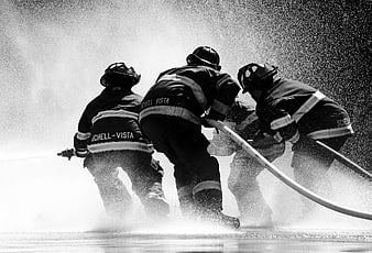 Firefighters battling blaze with high-pressure hose