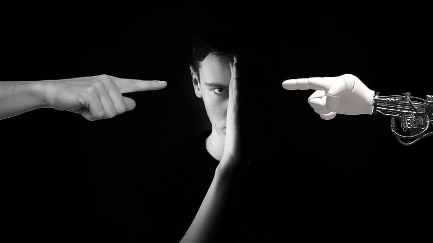 Man facing human and robotic pointing fingers in black and white