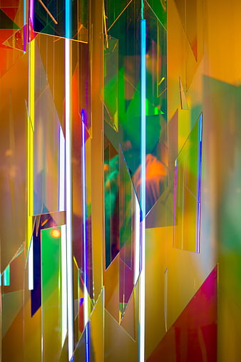 Abstract colorful glass shards with vibrant neon reflections