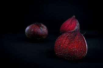 Fresh Red Beetroots on Black Background
