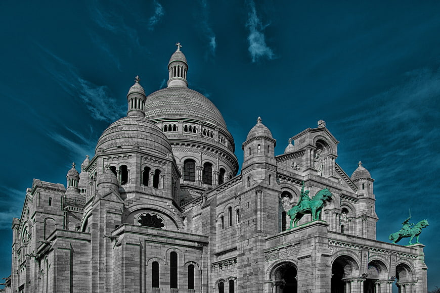 Sacre Coeur Basilica Paris with dramatic teal sky