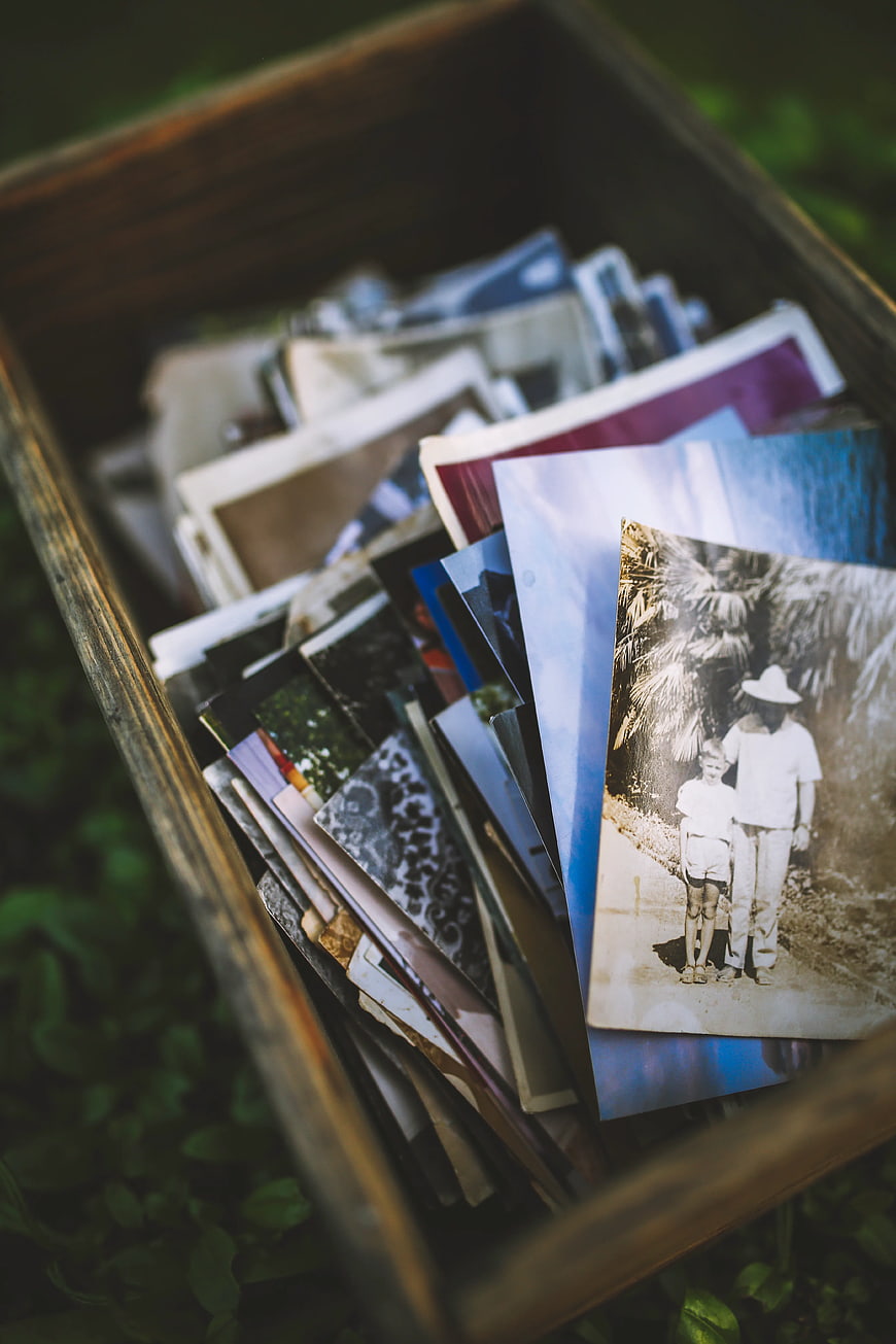 Vintage photos in wooden box with nostalgic memories