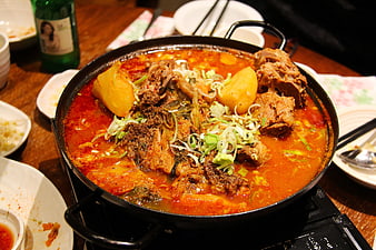 Spicy Korean Pork Bone Stew with Potatoes and Green Onions
