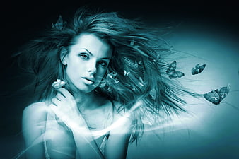 Artistic portrait of woman with flowing hair and butterflies