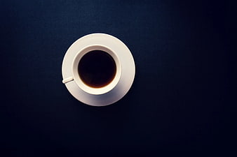 Top View White Coffee Cup on Dark Blue Background