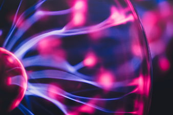 Abstract Plasma Ball with Neon Pink and Blue Lightning