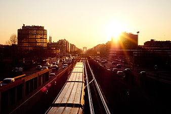 Paris Metro Train Sunset View Towards Arc de Triomphe
