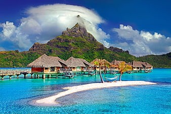 Tropical Overwater Bungalows with Mountain and Sandbar