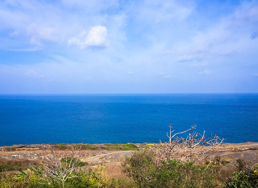 Scenic coastal landscape with blue ocean and sky