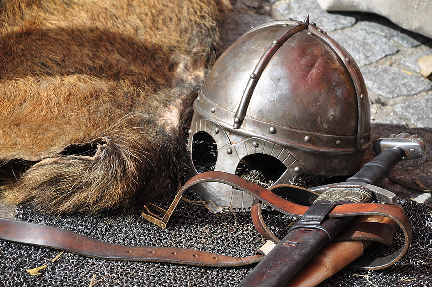 Medieval Knight Armor, Sword, and Helmet on Chainmail