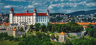 Bratislava Castle panoramic view with red roof and blue sky