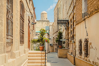 Narrow historic stone alleyway in Baku, Azerbaijan