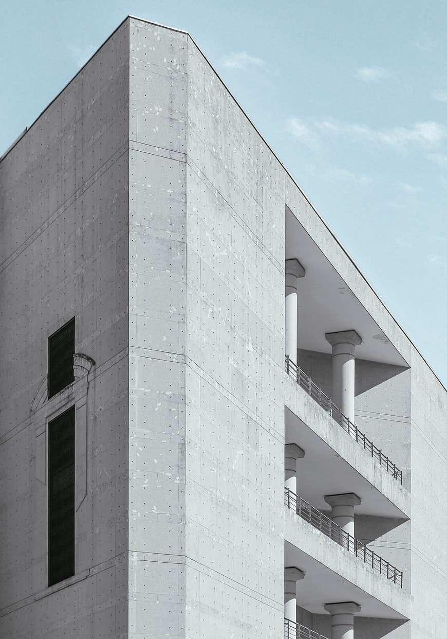Modern Concrete Architecture with Balconies and Blue Sky