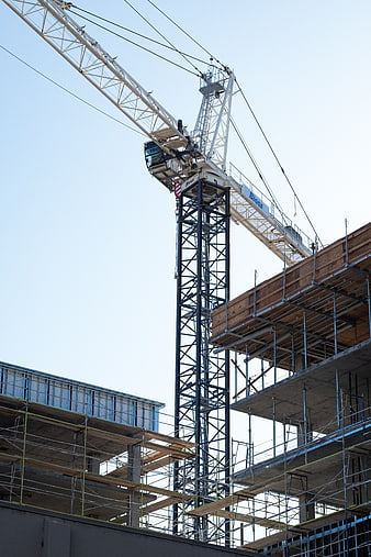 Tower Crane at Construction Site with Scaffolding