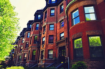 Low angle view of historic red brick brownstones in Boston