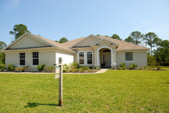 Single-story suburban home for sale with front yard