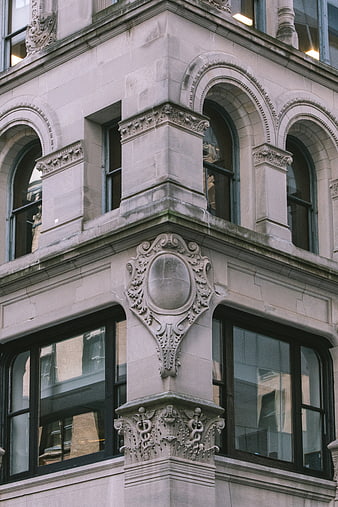 Ornate stone facade of a historic corner building