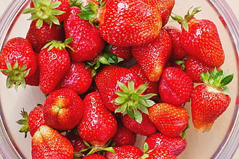 Fresh Red Strawberries in a Clear Glass Bowl