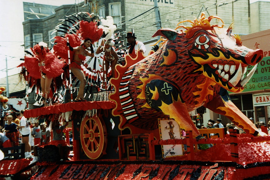 Vibrant Chinese New Year parade float with dragon and dancers