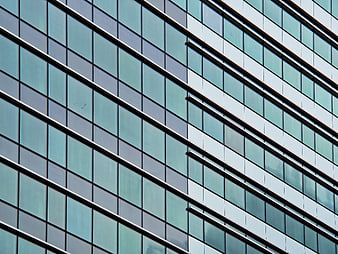 Abstract Modern Glass Building Facade with Geometric Pattern