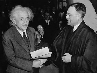 Albert Einstein Receiving American Citizenship Certificate