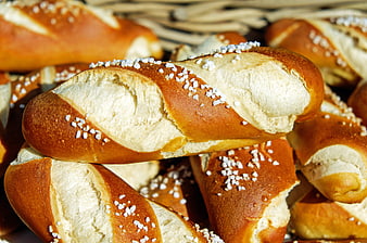 Freshly baked pretzels with coarse salt in a basket